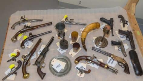 Some of the weapons and historical artifacts recovered from a decades-long investigation