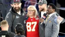 Philadelphia Eagles center Jason Kelce (left) stands with his mom, Donna, and Kansas City Chiefs tight end Travis Kelce (second from right) at Super Bowl LVII