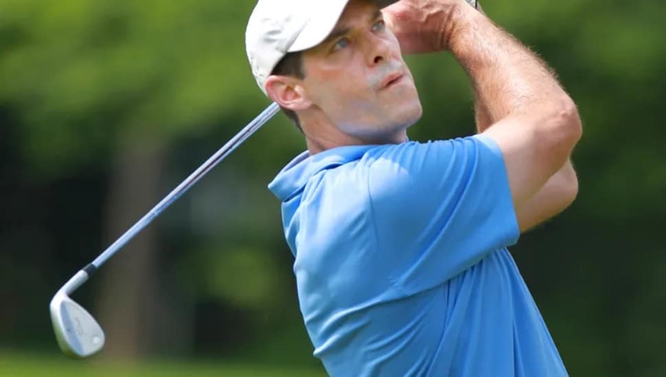 Mike McDermott hits a shot in the Masters Tournament, but it didn't count officially