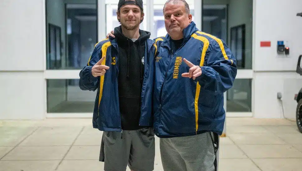 Ridley Park’s Zachary Deemer and Drexel Hill’s Lee Strofe of the Neumann University national champion roller hockey team.