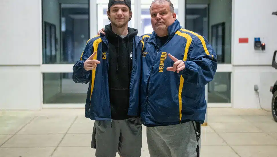 Ridley Park’s Zachary Deemer and Drexel Hill’s Lee Strofe of the Neumann University national champion roller hockey team.