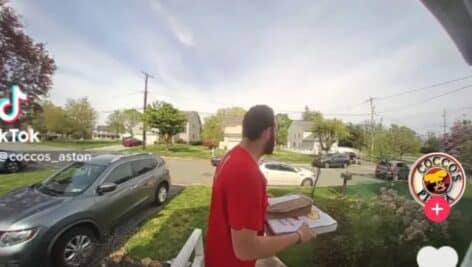 Tyler Morrell delivering pizzas at a Preston Avenue home in MIddletown during the police chase