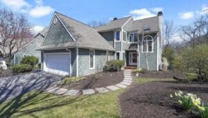 The front of a property and home for sale at 37 Horseshoe Lane in Newtown Square