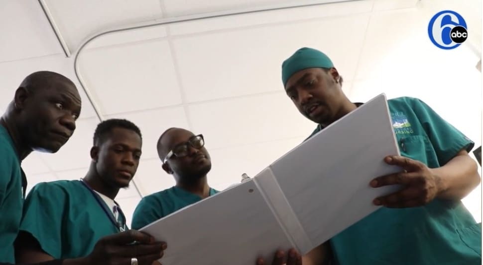 Cliff Konah with other male nursing students at the Delaware County Technical Schools Practical Nursing Program