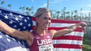 Allie Wilson draped in an American Flag was a finalist in the 2020 Olympic Team Trials in the 800 meters