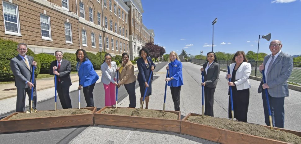 Breaking ground Saturday for the new campus are (from left) Michael Ranck, president and CEO of the Community YMCA of Eastern Delaware County; Kevin Scott, DCCC trustees board chair; Dr. Monica Taylor, Delaware County Council chair; state Rep. Gina Curry, Pennsylvania House Speaker Joanna McClinton; Delaware County Community College President Dr. L. Joy Gates Black; U.S. Rep Mary Gay Scanlon; DCCC student speaker Alana Robinson; Building Community Campaign Co-Chair Sharon Kelleher; and Building Community Campaign Co-Chair Andrew Kelleher