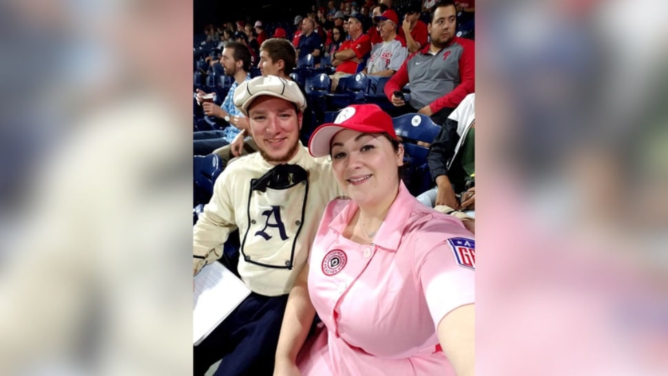 Matt Albertson with his wife, Jess, at a Phillies game