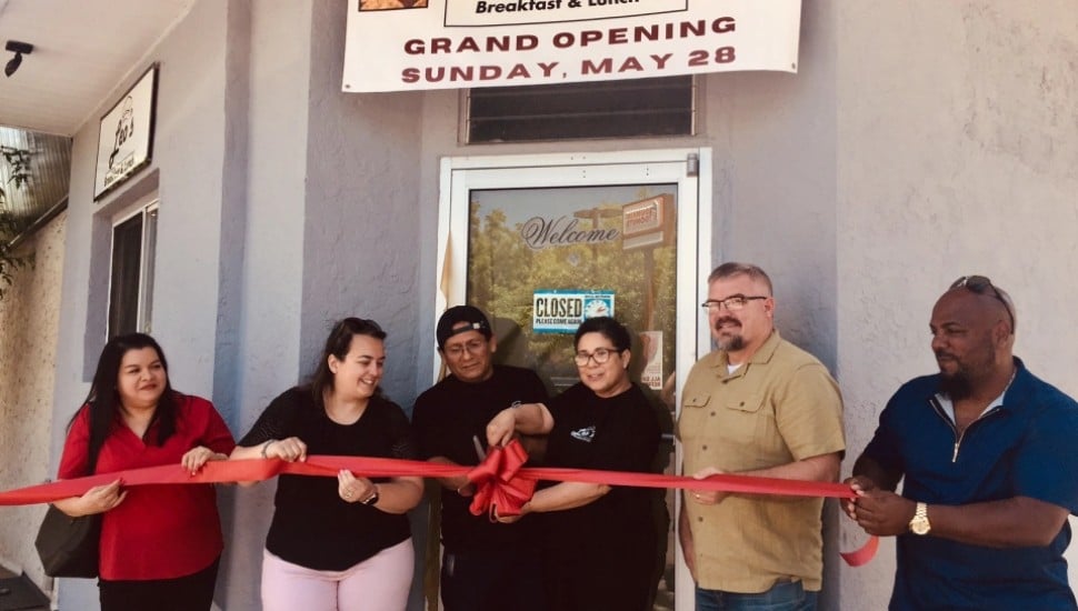 Cutting the ribbon at Leo's Cafe are (from left) Romelia Cruz, Lansdowne Mayor Magda Byrne, Walter Jaico, owner Leonarola "Leo" Cruz, Lansdowne Borough Council President Benjamin Hoover and Jose Aponte.