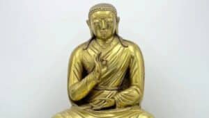 This bronze Tibetan Buddha figurine sold at auction for $200,000.