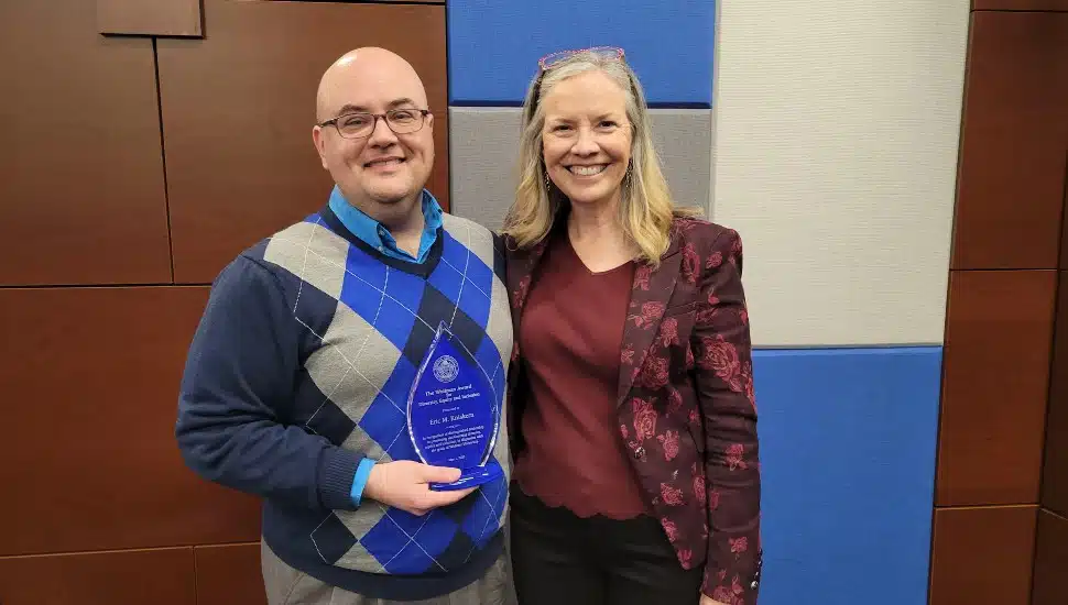 Eric Kniskern with Widener University President Stacey Robertson.