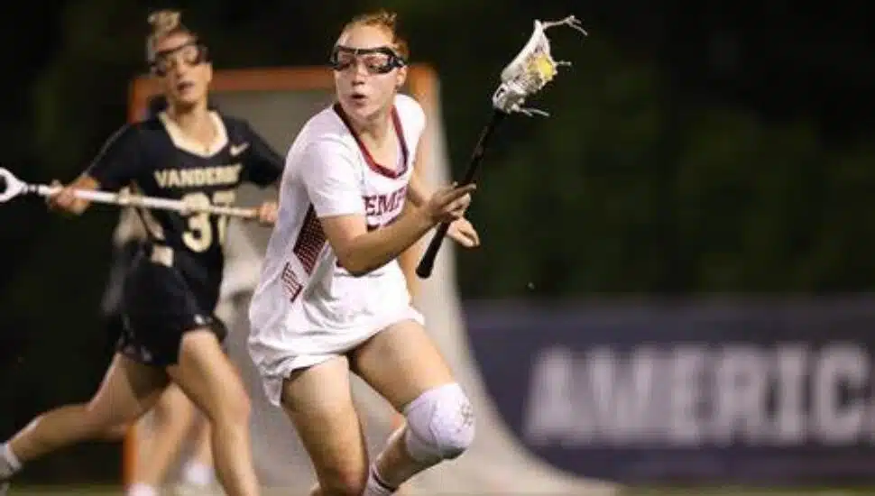 Belle Mastropietro playing midfielder during a lacrosse game.