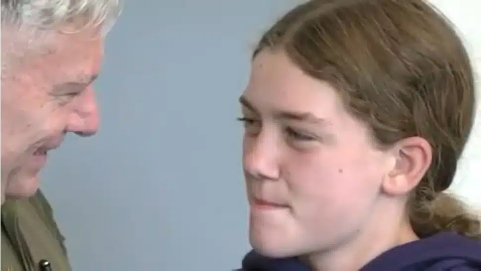 Patrick Creed surprises his daughter with a visit to the Haverford Middle School.