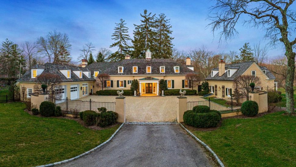 The front entrance to a carriage house for sale in Wayne.