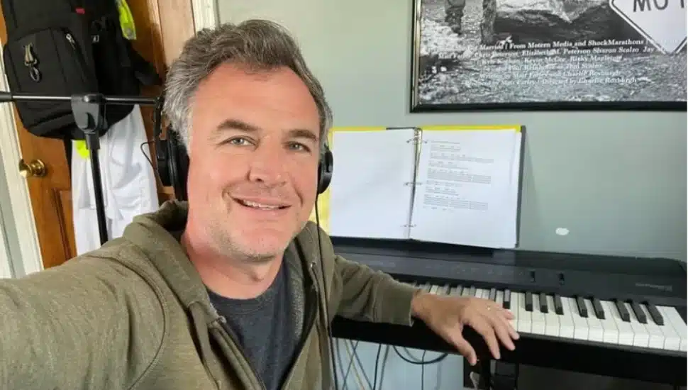 Matt Farley sitting at his piano.