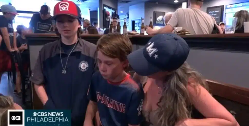 Fans of the Media Little League team gather at the State Street Pub to watch the game.