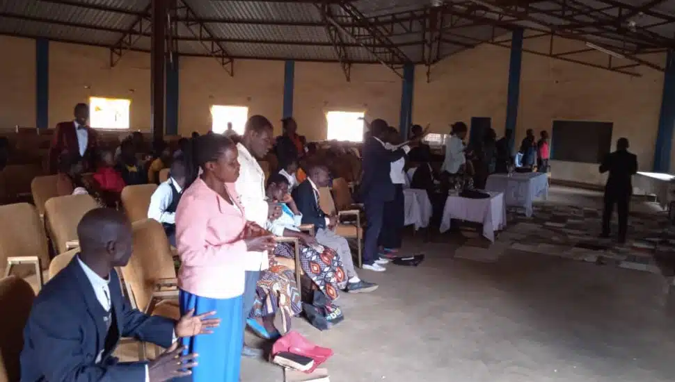 Members of a church in Lilongwe in southeast Africa make use of repurposed chairs from Freedom Village at Brandywine during a church service.