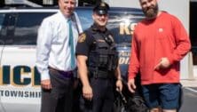 The Haverford Police Department's newest K-9 Officer Winnie, with her handler Officer Anthony Patterson, car dealer Steve Videon, left, and the Philadelphia Eagles' Jason Kelce.