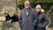 Matt and Melane with their favorite animal, the red pandas, at the zoo.
