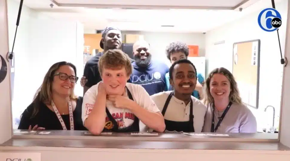 Working behind the counter at the student store 85 North Cafe at the Marple Education Center