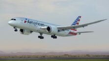 An American Airlines plane taking off from Philadelphia International Airport.
