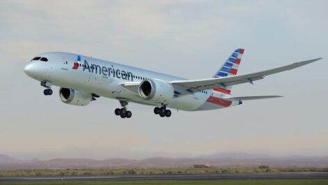An American Airlines plane taking off from Philadelphia International Airport to many preferred top holiday flight destinations.