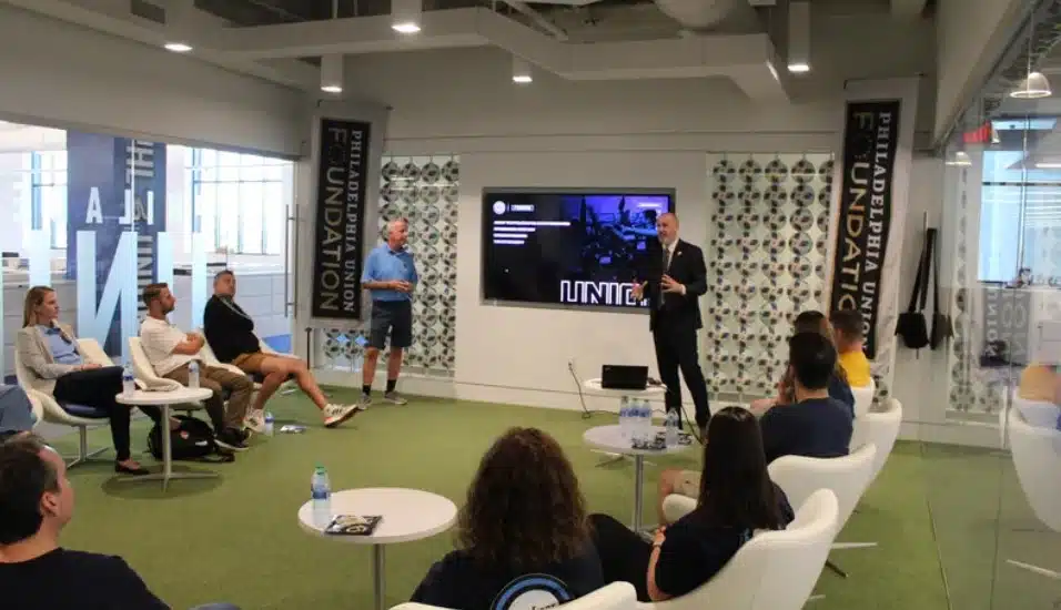 Philadelphia Union Foundation executive director Paul Howard and board member John McClung speak to representatives from Delaware County youth soccer clubs about HeadFirst.