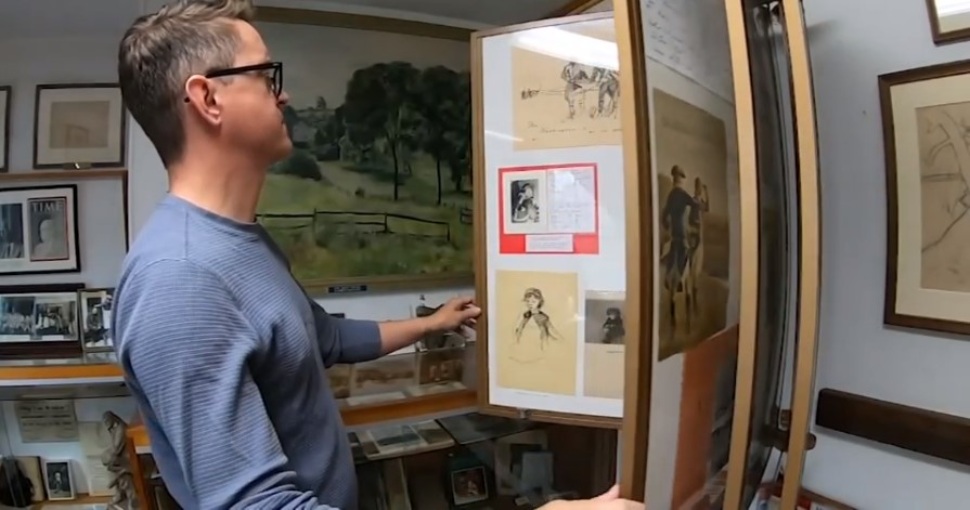 A visitor to the Christian C. Sanderson Museum in Chadds Ford looks through an exhibit.