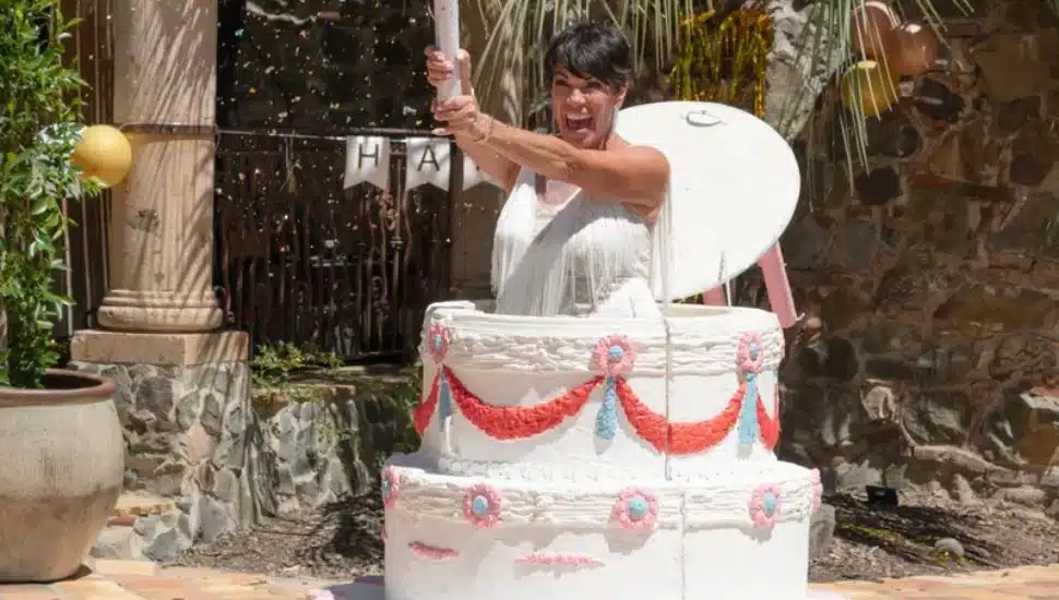 Susan Noles from Aston is full of surprises as she bursts out of a cake on 'The Golden Bachelor'.