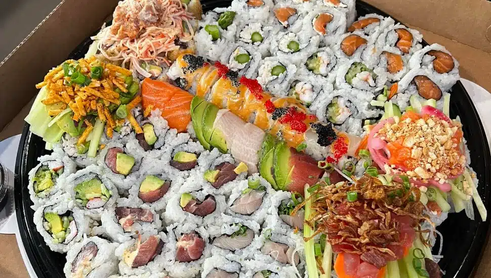 sushi platter in pizza box