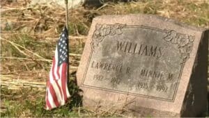 The grave site of an African American veteran at the Green Lawn Cemetery in Chester Township recently restored by resident volunteers.