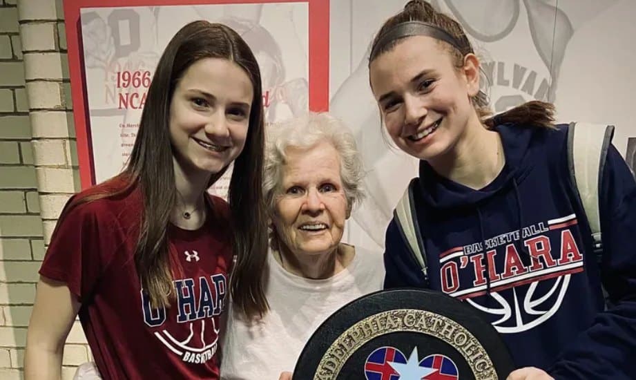 Molly Rullo (right with sister Megan Rullo (left) and their grandmother Eileen at the Palestra after Molly's Cardinal O'Hara team won the Philadelphia Catholic League title.