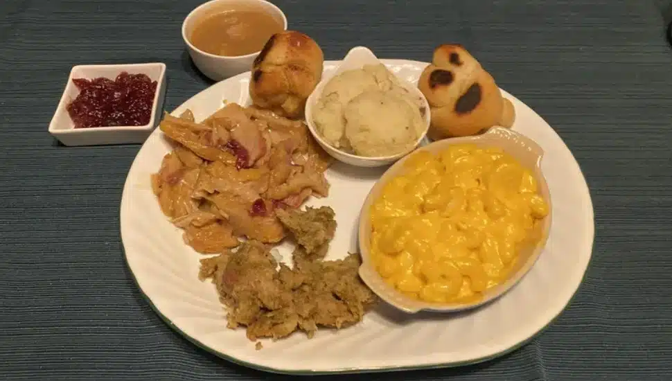 It's a Wawa Thanksgiving with a Thanksgiving platter and some Wawa sides, including mac and cheese and garlic knots.