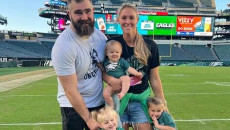 Jason and Kylie Kelce pose with their three daughters Bennett, Elliotte and Wyatt
