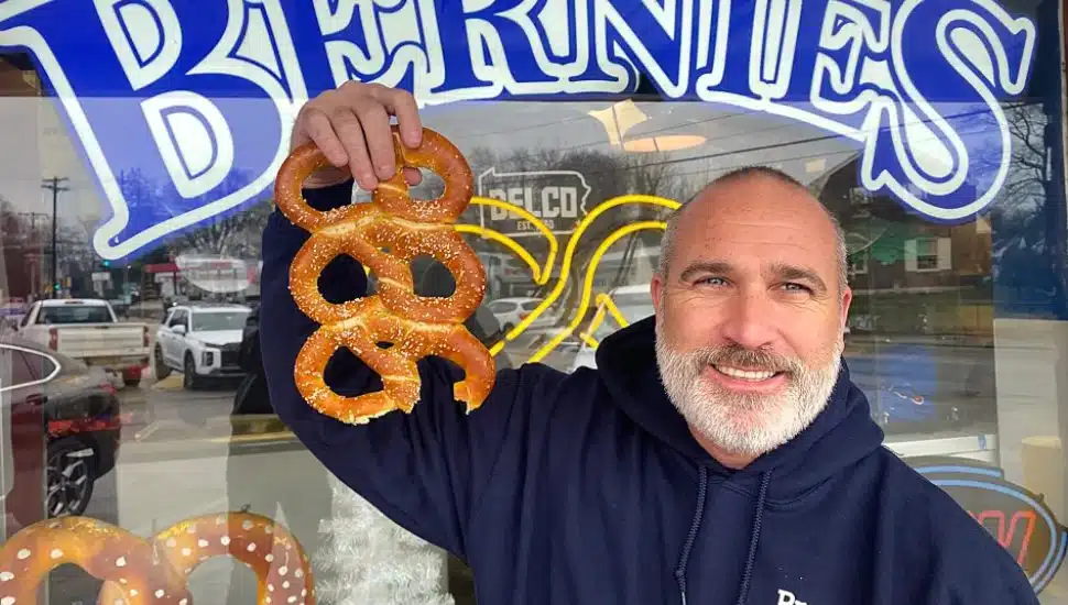 Mike Stark holds several Bernie's Pretzels.