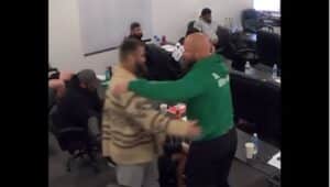 Philadelphia Eagles Jason Kelce and Lane Johnson embrace after it was announced that Johnson has been nominated for the Walter Payton Man of the Year Award.