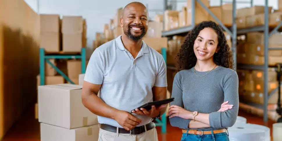 A Black man and woman in their small business.