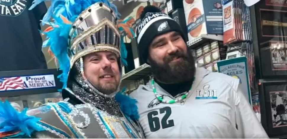 Jason Kelce poses with a fan at Carl's Cards and Collectibles in Havertown during one his visits there.