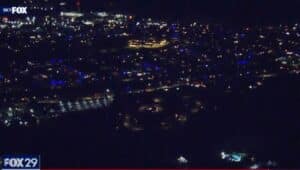 A helicopter view of Broomall shows much of the community draped in blue light.