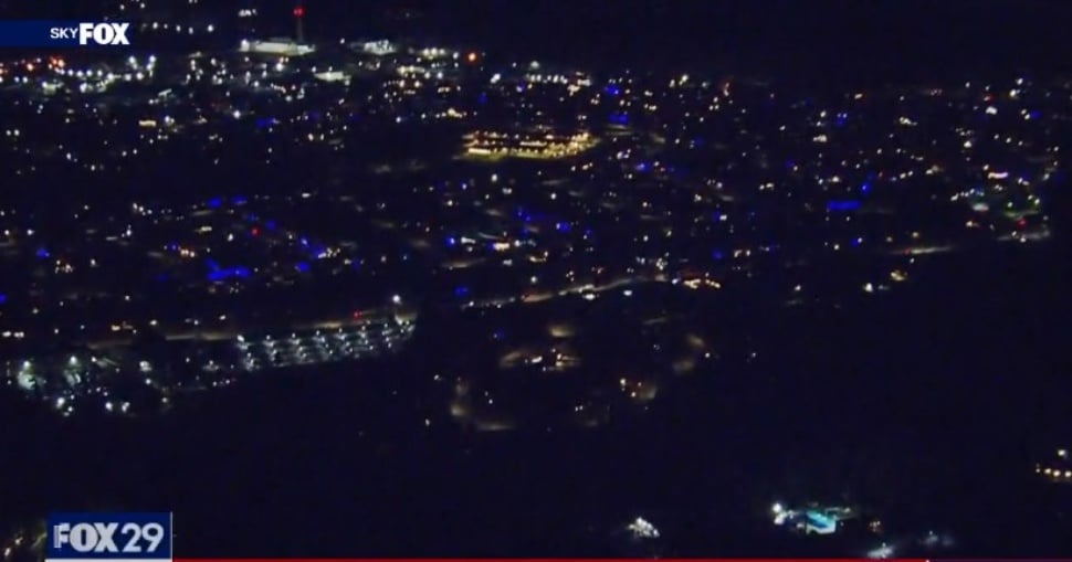 A helicopter view of Broomall shows much of the community draped in blue light.