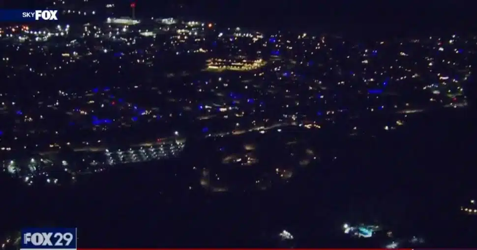 A helicopter view of Broomall shows much of the community draped in blue light.