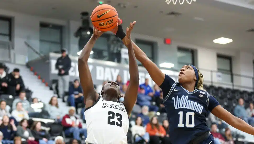Villanova forward Christina Dalce blocking a shot during a game.