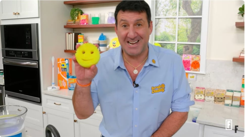 Aaron Krause, inventor of the Scrub Daddy, demonstrates the product.