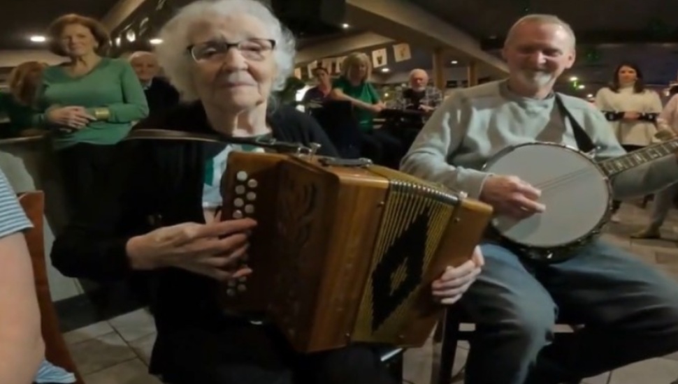 Mary Gillian joins the other musicians for some Irish music at the Fainting Goat in Glenolden.