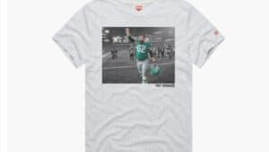 A Jason Kelce T-shire featuring an image of Jason Kelce in uniform at The Linc with the words "Pay Homage."