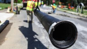 Aqua PA replaces aging water infrastructure, installing 17,000 ft of ductile iron mains to enhance water flow in Chester County.