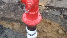 Fire hydrant being repaired.