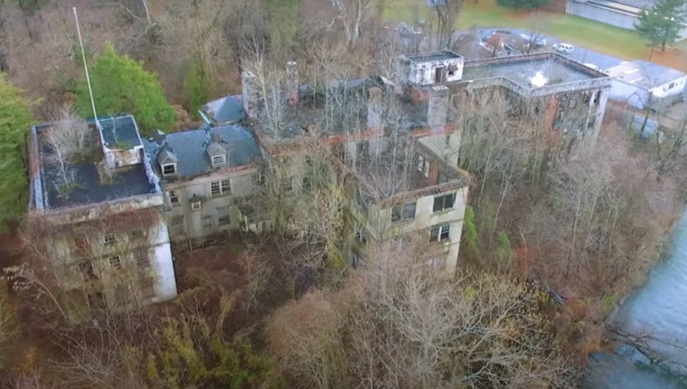 The 10,000 square-foot abandoned McNeal Mansion sits across the river from Bristol in Burlington, New Jersey.