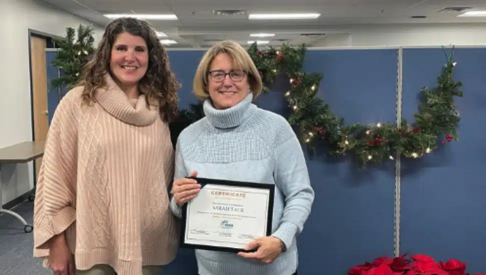 Sarah (right) is seen here with Jennifer Hernandez, coordinator of Business Development for CCRES.