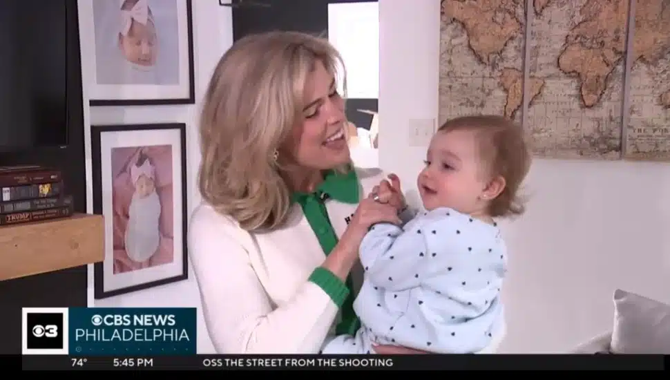 Julia Rae with a baby.