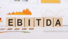 wooden blocks spelling out the word "EBITDA"